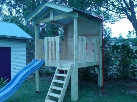 Medium Fort Cubby House - plain wooden design with blue slide