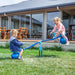 Image of 2 little kids playing on the Bubble Kids See Saw  in an outdoor background