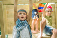 Climbing Cube Play Centre - little girl hanging on a trapeze