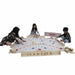 3 kids playing the giant scrabble