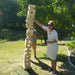 127cm giant jenga next to a person and it is falling