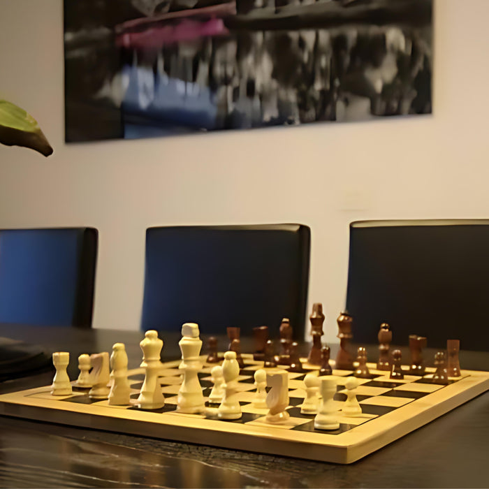 image of the board set up for chess on a dining table