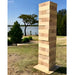 91cm giant jenga outside on the grass with water in the background 