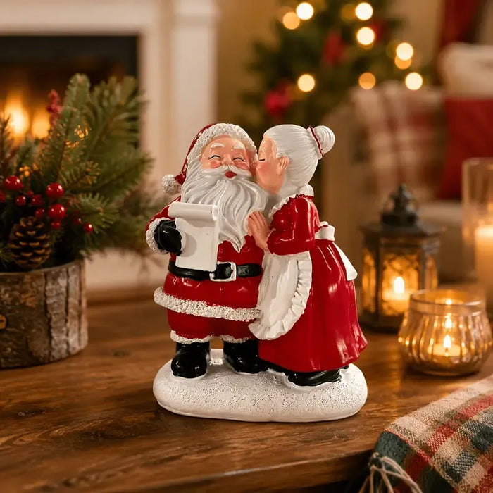 Santa & Mrs Claus Kissing Resin Figurine