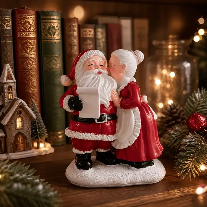 Santa & Mrs Claus Kissing Resin Figurine
