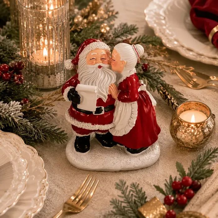 Santa & Mrs Claus Kissing Resin Figurine