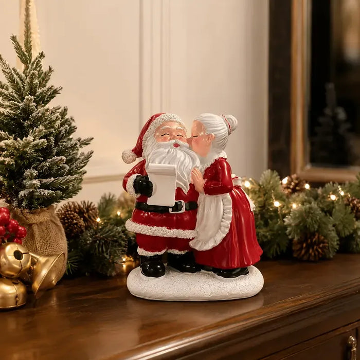 Santa & Mrs Claus Kissing Resin Figurine