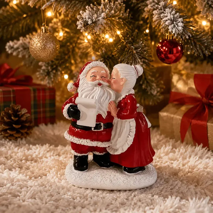 Santa & Mrs Claus Kissing Resin Figurine