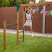 Coburg Lake Wooden Playground set with monkey bars and a happy birthday banner