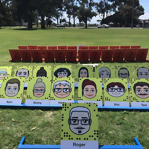 image of giant guess who set up outside on grass 