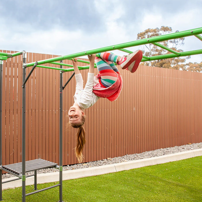 image of a child on the monkey bars from the junior jungle safari 