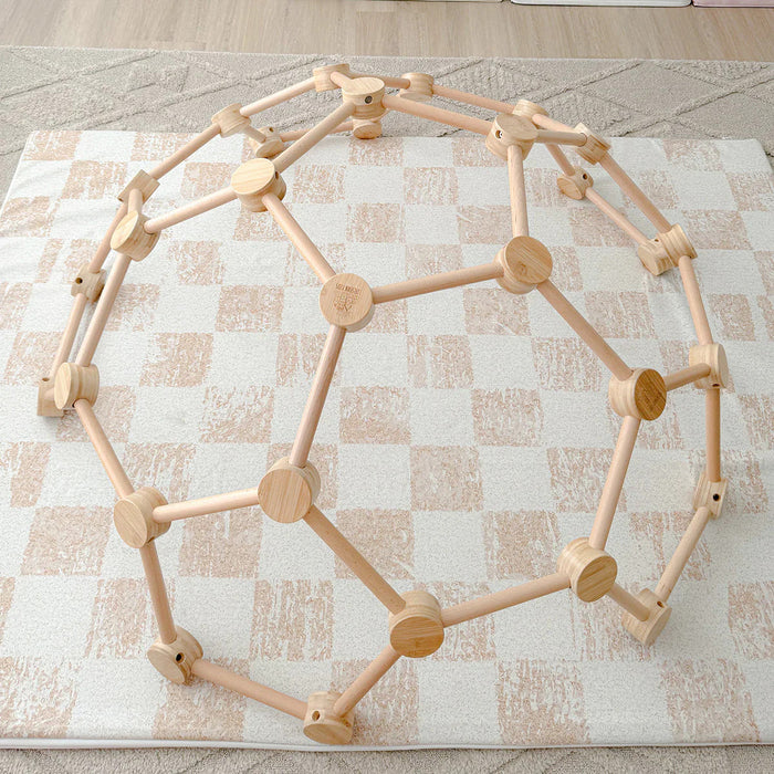 Wooden geometric structure on a checkered floor