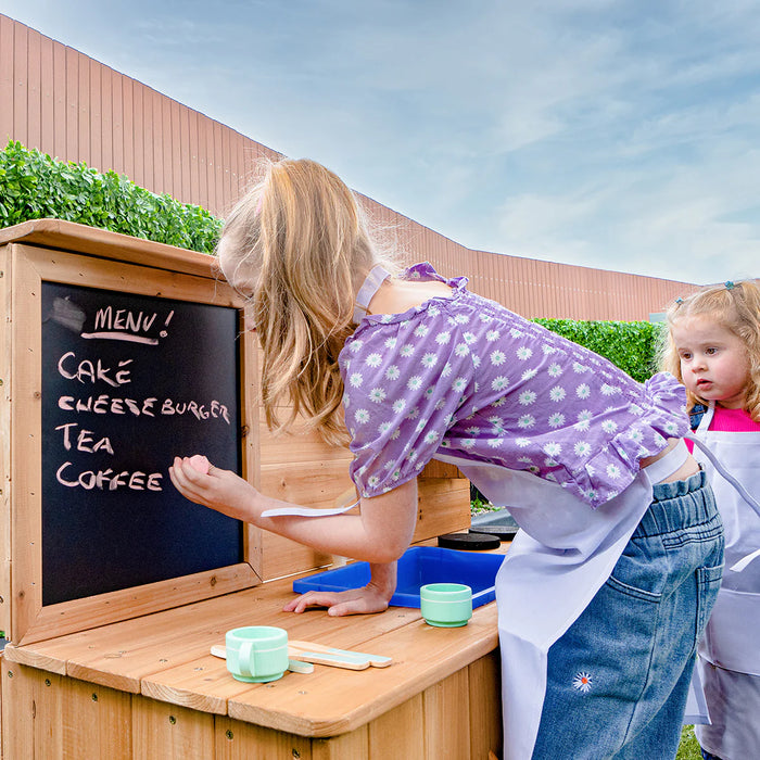 Children playing at the Lifespan Kids Roma mud kitchen