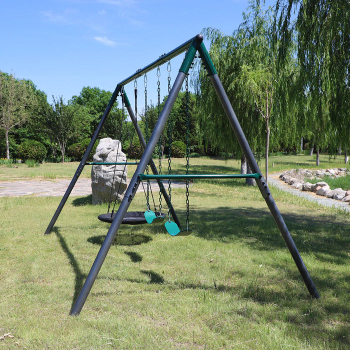 photo of the titan swing set with a side view outside on grass near a lake