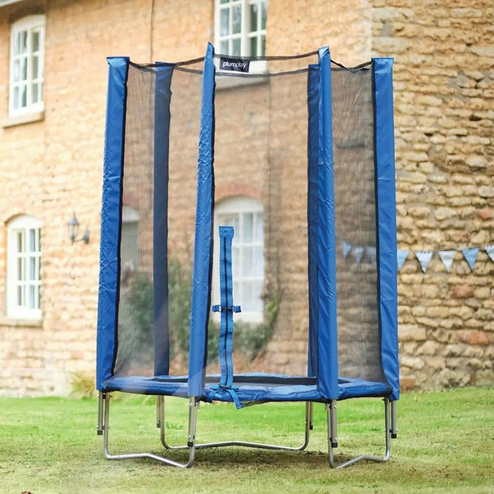 Plum 4ft Junior Kids Trampoline blue outside on grass and in front of a building