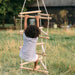 Full image of little kid climbing on the 3 Side Rope Ladder With Hangar with outdoor background