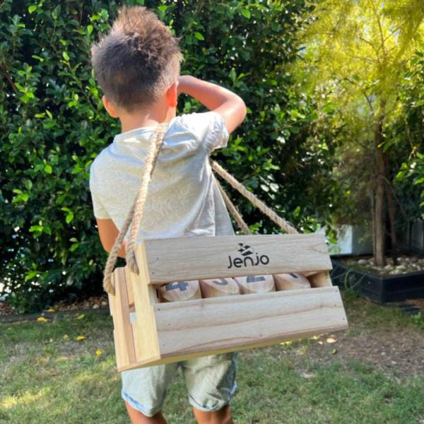 image of the scatter game and the box it comes with a child carrying it ...