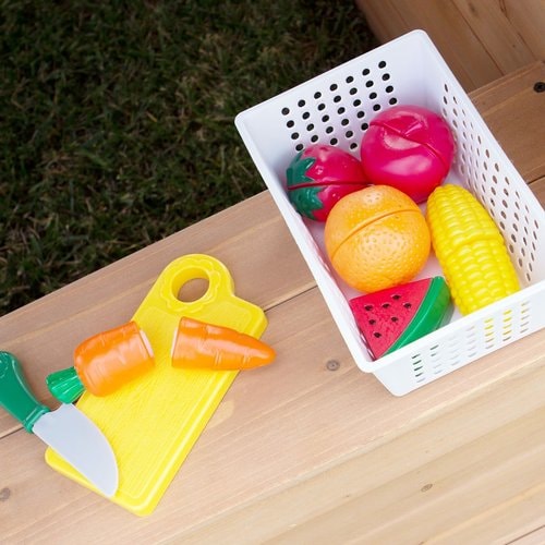 Close up image of Kitchenette, with sliceable fruit and Vegetable Basket Complete with Plastic Knife and Cutting Board of Aspen Cubby Playhouse