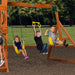 Image of 3 little children swing on the swings and trapeze of Backyard Discovery Atlantis Play Centre Swing And Play Set