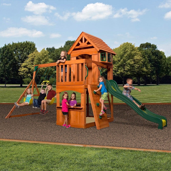 Full angle view of Backyard Discovery Atlantis Play Centre Swing And Play Set with children playing in outdoor background
