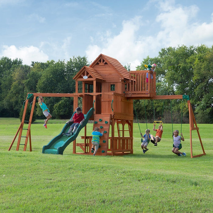 Full image of Skyfort II Swing And Play Set with little children playing with outdoor background