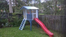 Small Fort Cubby House - painted in white and dark blue with red slide