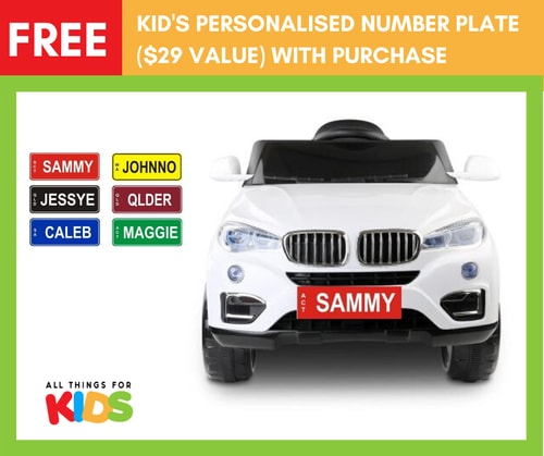 Front image of a white kids car with personalised number plates