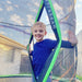 10ft HyperJump3 Kids Springless Trampoline with a child coming through the trampoline entry