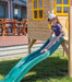 Close up image of a little girl sliding on the Archie Cubby House with slide