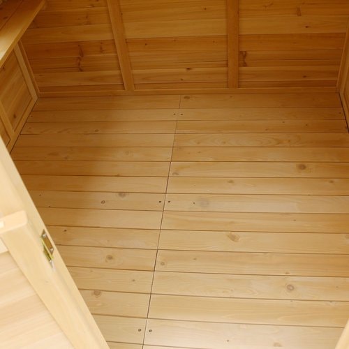 Close up image of wooden flooring of Archie Cubby House with slide