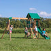 Image of 4 little children playing in the Buckley Hill Play Set in outdoor background