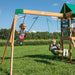 Close up image of 2 children swinging on the swings of Buckley Hill Play Set and one child on the lookout area in outdoor background