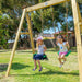 Holt Swing Set  - two girls riding happily on the swing