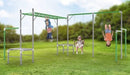 Full image of Junior Jungle Kuranda with 3 littles kids playing, one climbing on the monkey bars, one swinging in the swing and one swinging upside down on the trapeze with outdoor background
