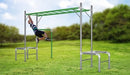 Full image of Junior Jungle Monkey Bars with a little boy hanging on the monkey bars in outdoor background