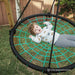 Oakley Swing Set 1M - little kid relaxing on the spider swing