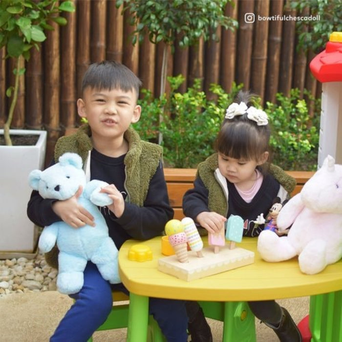 Wombat V2 Cubby House - kids playing in the table