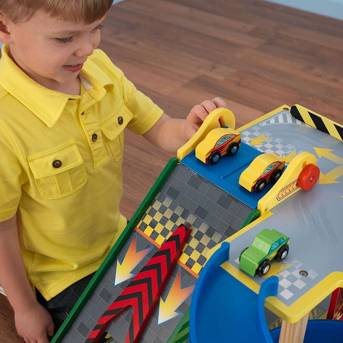 Mega Ramp Racing Set - car ramp toy with little boy playing the car at the giant launch ramp