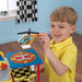 Mega Ramp Racing Set - car ramp toy with little boy holding the helicopter from the helipad