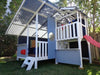 Mega Triplex Cubby House - painted in shades of blue with white and red slide