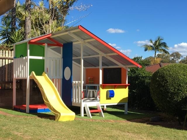 Mega Triplex Cubby House - colourful design with yellow slide