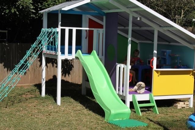 Mega Triplex Cubby House - with green slide and climbing net