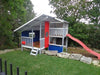 Mega Triplex Cubby House - white painted with blue paint on some walls. Have a light red slide