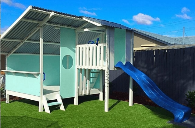 Mega Triplex Cubby House - calming design painted in light blue and dark blue slide