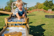 one child playing with water balls with the forest water run