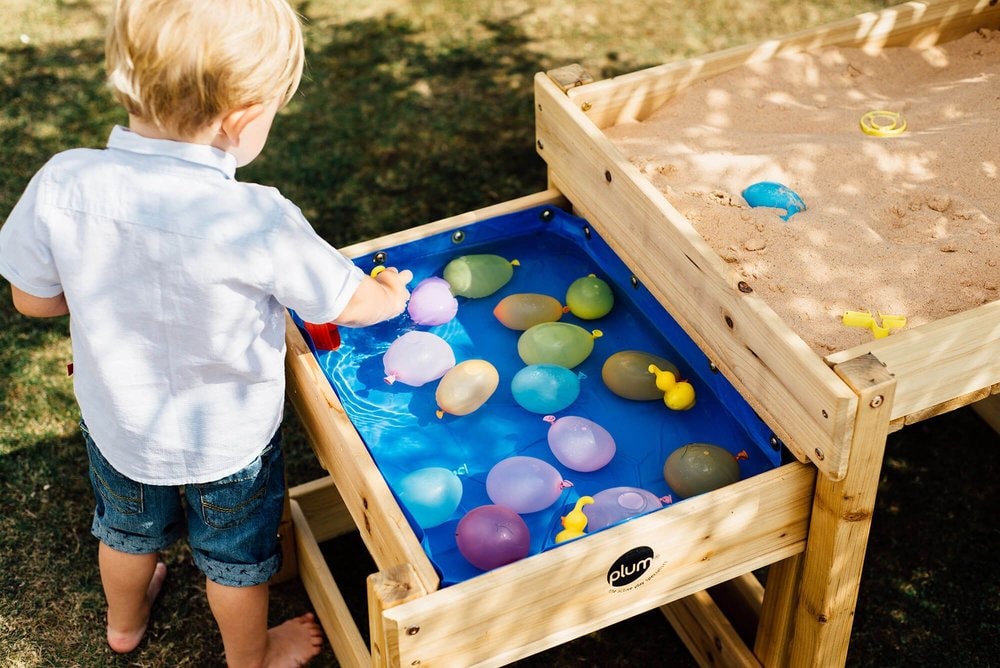 Sand And Water Table Bundle - little boy playing in the water table