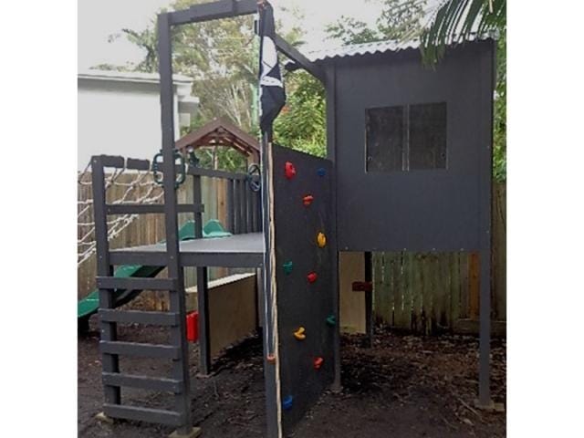 The Adventurer Cubby House - painted in black